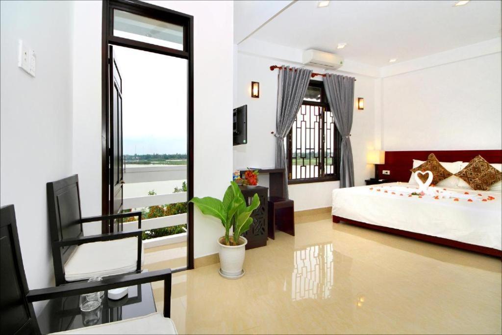 Riverlife Homestay Хойан Экстерьер фото
