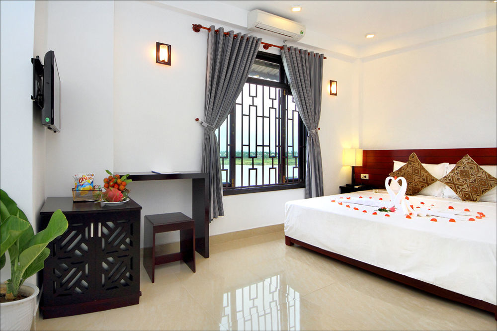 Riverlife Homestay Хойан Экстерьер фото